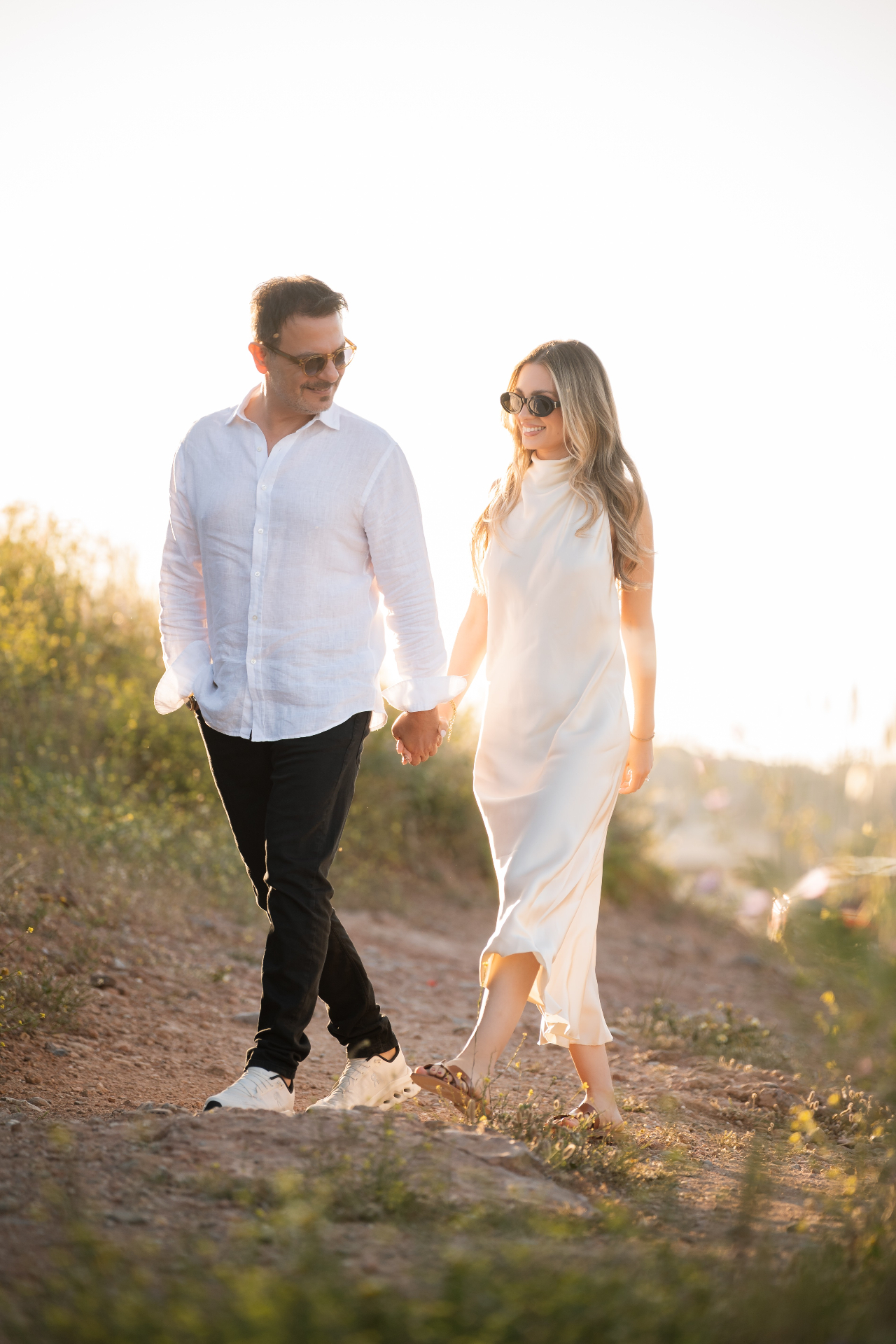 Takis and Xenia walking in golden hour